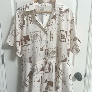 Commense semi sheer, button up jumpsuit. Beach vibes, lined bottom, resortwear